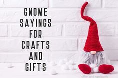 gnomes sayings for crafts and gifts on white brick wall with snow balls in foreground