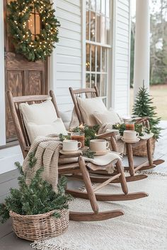 rocking chairs with christmas decorations on the front porch