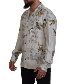 Stunning Dolce & Gabbana Silk Shirt with Bird Print Model: Casual pajama look satin shirt Fitting: Regular fit Material: 100% Silk Color: White bird print Front button closure Logo Details Made in Italy Size on Tag: IT5 | M It Logo, Italian Elegance, White Bird, Satin Shirt, Dolce E Gabbana, Bird Print, Print Models, Silk Material, Guess Jeans