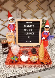 there is a sign that says sunday's are for sundaes on the counter