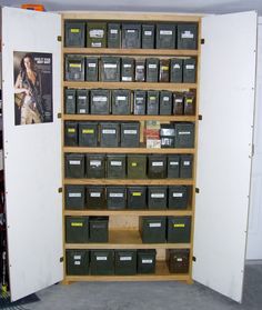 there are many boxes on the shelves in this storage room and it is organized with bins