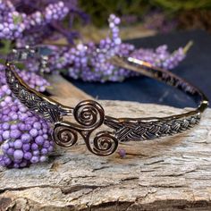 TAKE AN ADDITIONAL 20% OFF THE ALREADY REDUCED SALE PRICE - ADDITIONAL 20% IS DEDUCTED AT CHECKOUT with code SAVE20 Stunning and very lovely! Our "The Strength of Three," Triskele Celtic knot Bangle Bracelet is a must have. It is embraced on both sides by approximately 5/8" of a braided Celtic knotwork pattern which is defined by light antiquing. The remainder of the bangle is sleek and unadorned. A safety chain provides elegance and peace of mind! Rhodium over lead-free pewter throughout. A ric Spiral Bracelet, Celtic Spiral, Knot Bangle, Beautiful Symbols, Celtic Knotwork, Safety Chain, Crystal Design, Traditional Jewelry, Celtic Knot