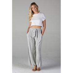 Your Go To Spring/Summer Pants Are Here! These Wide Leg Pants Features An Elastic Waistband In The Back, A Tie Sash In The Front (Or You Can Tie It In The Back), And Pockets! The Way The Black And White Threads Are, Gives The Look Of Gray Stripes. Materials: 100% Rayon Color: Black & White O13 White Bottoms With Tie Waist For Day Out, Summer Bottoms With Tie Waist For Day Out, Casual Summer Pants With Tie Waist, White Summer Pants With Tie Waist, Tie Waist Wide-leg Pants For Summer, Tie Waist Wide-leg Summer Bottoms, Summer Wide-leg Pants With Tie Waist, White Summer Wide Leg Pants With Elastic Waistband, Summer Wide-leg Bottoms With Tie Waist