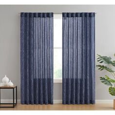 the curtains in this living room are blue