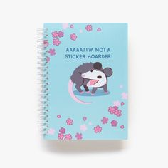 a spiral notebook with an image of a panda bear on it and the words aaaa i'm not a sticker hordr