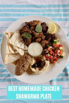 the best homemade chicken shawarma plate is ready to be eaten on the table