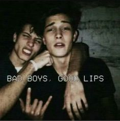 two young men with their arms around each other and the words bad boys, good lips