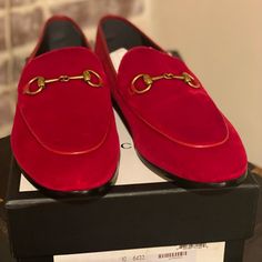 Set Trends With These Loafers From The House Of Gucci. Meticulously Crafted And Features A Feminine Exterior And The Horsebit Detail In Gold-Tone On The Vamps. Complete With Comfy Insoles And Robust Outsoles, This Pair Will Enhance All Your Ensembles. Gucci Horsebit Jordaan Velvet Loafer In Red Slip-On Style Horsebit Detail Flat .5" Heel Slim Shape Size: 39 Eu Product Number: 431467 Made In Italy Luxury Red Almond Toe Loafers, Designer Red Loafers With Round Toe, The House Of Gucci, Velvet Loafers, Shoes Gucci, Gucci Horsebit, House Of Gucci, Gucci Mules, The Vamps