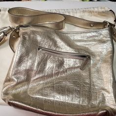 I Am Selling Many Bags From My Sisters Collection While Working At Coach. Bags Are All Like New, Dust And Scuff Free Kept In Dust Bags In A Pet Free Closet. This Bag Is A Coach Bucket Legacy Duffel Convertible 19894 Gold Silver Leather Cross Body Bag 13"L X 5"W X 12"H Gold Crossbody Hobo Bag For Formal Occasions, Gold Formal Crossbody Hobo Bag, Luxury Gold Hobo Bag For Travel, Designer Gold Bucket Bag For Everyday Use, Coach Gold Crossbody Satchel, Gold Coach Crossbody Satchel, Designer Gold Bag With Adjustable Strap, Coach Gold Satchel For Everyday Use, Gold Coach Shoulder Bag For Shopping