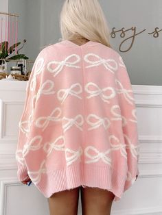 Cozy up in style with our Bow My Way Cardigan from Sassy Shortcake. This oversized cardigan features a playful pink hue and a charming bow detail, making it the perfect addition to any outfit. Stay warm and on-trend with this must-have piece. fit: oversized (model wearing a size small) content: 60% acrylic 20% chinlon 20% polyester care: hand wash cold Our current stock is sold out. Only Preorder is available - ships late December Sassy Shortcake, Lounge Fashion, Bow Cardigan, Patriotic Dresses, Pink Winter, Girly Aesthetic, Cardigan Pink, Pink Cardigan, Shoe Gifts