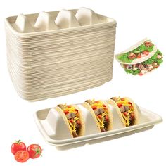 three tacos and four plates with tomatoes on the side