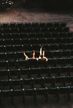 some people are doing tricks on the bleachers