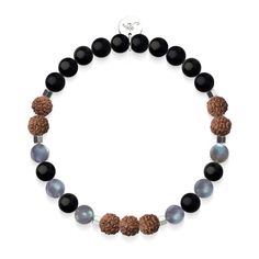 Discover the spiritual connection with this Rudraksha Mala Bracelet from NOGU. Featuring a combination of Rudraksha, Obsidian, and Labradorite beads, this bracelet is strung on a clear elastic cord with a circumference of 7.8 inches. The metal finish is silver, while the metal base is stainless steel. The beads range in size to 6mm. Rudraksha beads, revered as the tears of Shiva, are believed to connect the wearer to pure consciousness and balance the mind and emotions. Wear this unisex bracelet Spiritual Rondelle Beaded Bracelet With Spacer Beads, Fusion Style Hand-strung Beaded Bracelets As Gift, Fusion Style Beaded Bracelets As Gift, Fusion Style Polished Beaded Bracelets As Gift, Fusion Style Polished Beads Bracelet As Gift, Fusion Style Polished Beaded Bracelets For Gifts, Spiritual Onyx Beaded Bracelets For Meditation, Spiritual Onyx Beaded Bracelets Gift, Meditation Onyx Beaded Bracelets With Round Beads