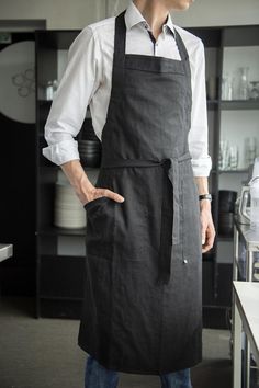 Stylish, adjustable length linen apron for man. Natural and comfortable men's aprons are made with large comfy pockets + loop for easy hanging. Great for daily use. Perfect as a gift!* length: 44" / 112 cm* width: 26" / 66 cmModel, Lukas is 75" / 190cm tall, wears black linen apron* find more aprons and kitchen linens here:https://www.etsy.com/shop/LovelyHomeIdea?section_id=18945683* safe Oeko-TEX® Standard 100 certified linen fabric.* designed and carefully handmade by Lovely Home Idea in small Apron Outfit Men, Man In Apron Drawing, Apron For Cooking, Waiter Outfit Men, Cooking Aprons For Men, Chef Outfit Men, Barista Outfit Men, Men Aprons Ideas, Guy In Apron