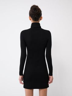 Maybe the easiest, most satisfying purchase you will make this Fall. The turtleneck mini dress joins the ranks of our basic core collection, now in timeless, classic black. Simple, yet sexy, but also sophisticated. All the things. Our custom-dyed eco-merino fabrication is a combination of biodegradable extra-fine merino wool, plant-based viscose and recycled Lycra. It’s just as soft as peachskin but has a warmer, wooly hand feel, perfect for the colder winter months. Some pilling may occur, but Sleek Turtleneck Workwear Dresses, Classic Black Stretch Bodycon Dress, Elegant Turtleneck Mini Dress For Evening, Sleek Turtleneck Dress For Fall, Turtleneck Mini Dress For Evening, Black Turtleneck Bodycon Dress For Winter, Elegant Turtleneck Mini Dress For Fall, Evening Turtleneck Mini Dress, Elegant Fall Turtleneck Mini Dress