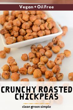 a white bowl filled with crunchy roasted chickpeas on top of a table