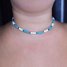 This is a handmade synthetic howlite choker-necklace with gold hematite square beads and white glass beads. Made from synthetic howlite, hematite beads, glass beads and closes with a stainless steel clasp and 2 inches stainless steel adjustable chain. SIZE This beautiful necklace is available in two sizes: 15inch-17inches and 17inches-19inches Every item we sell is handmade and handcrafted with love and care. All PolysJewelryArt jewelry arrived in a beautiful box or pouch ready for giving. We advise you to try to keep the jewelry away from water, chemicals and perfumes to keep it in perfect contition.  Feel free to contact me for any questions or requests. Cancellations - We accept cancellations within 12 hours of purchase. White Turquoise Necklace With Natural Stones, Adjustable, Adjustable White Turquoise Necklace With Natural Stones, Adjustable Howlite Beaded Necklaces For Gifts, Adjustable Blue Howlite Necklaces, Blue Beaded Howlite Necklaces, White Turquoise Gemstone Beads Necklace For Gifts, White Turquoise Necklace With Gemstone Beads As Gift, White Turquoise Necklace With Gemstone Beads For Gifts, Adjustable White Turquoise Necklace As Gift