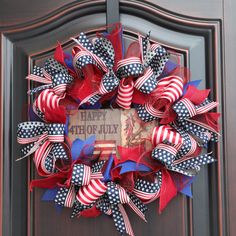 an american flag wreath on a door