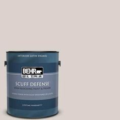 a yellow paint with the words behr ultra on it