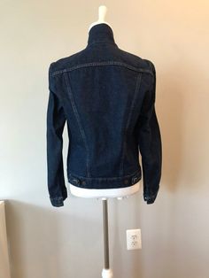 "Vintage Rustler Denim Jacket Made in USA from the 80's Size S(fits like US woman 4-6) Classic fit measurements- shoulder to shoulder:16\" armpit to armpit:19\" arm length:24\" total length: 24\" Classic darker washed denim with stitch details and buttons chest pockets. Very classic and original in excellent condition" Fitted Vintage Denim Blue Denim Vest, Retro Fitted Denim Vest With Button Closure, Fitted Denim Jacket With Snap Buttons For Fall, Fitted Denim Vest With Snap Buttons For Fall, Fitted Medium Wash Denim Jacket With Snap Buttons, Retro Fitted Medium Wash Denim Vest, Fitted Denim Jacket With Snap Buttons In Medium Wash, Fitted Retro Denim Vest In Medium Wash, Fitted Retro Medium Wash Denim Vest