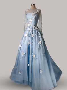 This stunning Anna Augusta evening maxi dress, available for $650 and brand new with tags, showcases exquisite craftsmanship in a breathtaking blue hue. Designed in a size 8, the dress features delicate floral appliqués that cascade across the bodice and flow down the sheer overlay of the skirt, creating a dreamy, ethereal effect. Perfect for elegant and special occasions, this dress promises a magical presence with its intricate detailing and flowing silhouette. Price: $650, an exceptional value for a brand new, designer gown. Condition: Immaculate, with original tags. Design: Luxurious blue fabric adorned with white floral appliqués. Size: Perfectly tailored for a size 8. Occasion Suitability: Ideal for weddings, galas, and formal parties. Ethereal Prom Dress, Cotillion Dresses, Blue Wedding Gowns, Drawing Help, Evening Maxi Dress, Fancy Clothes, Formal Parties, Sheer Overlay, Pretty Prom Dresses