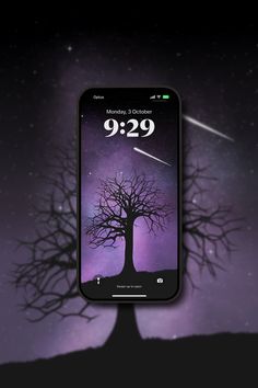 a cell phone with the time displayed on it's screen and an image of a tree in the background