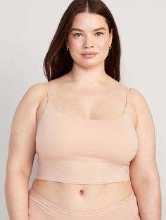 adjustable straps scoop neck 2-ply shelf bra provides light support for a-c cups fitted hits just below ribcage XS = 34A, 32B cup sizes; S = 32C, 34B, 36A cup sizes; M = 34C, 34D, 36B, 36C, 38B cup sizes; L = 34D, 34DD, 36C, 36D, 38B, 40B cup sizes; XL = 38DD, 40D, 40DD cup sizes; XXL = 42D, 42DD cup sizes.  models are approx.  5'9" and wear sizes s (4), l (12), and xl (18)machine wash according to the care instruction label Scoop Neck Bra With Medium Bust Support, Scoop Neck Stretch Bra With Adjustable Straps, Solid Camisole Bra With Light Support, Camisole Bra With Light Support, Scoop Neck Camisole With Removable Bra Pads, Scoop Neck Bra With Adjustable Straps, Solid Camisole With Bra-friendly Wide Straps, Crop Top With Adjustable Wide Straps, Solid Color Scoop Neck Bra With Light Support