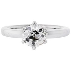 This solitaire style engagement ring is the perfect marriage of modern and vintage. It features a 1.52 carat Old European Cut diamond in a modern 14 karat, 2.5mm wide white gold setting. The diamond, has M color and VS2 clarity certified by GIA and is set in a six prong basket style crown. Perfect Marriage, European Cut Diamonds, Jewelry Rings Engagement, Solitaire Ring, Ring Verlobung, Diamond Cuts, Jewelry Rings, White Gold, Thing 1