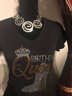 Birthday Queen Bling T-shirt.   T-shirt is available in both unisex and fitted sizes.  The fitted t-shirts run very small and maybe a size smaller than what you would normally wear. Please note this shirt has a cap sleeve.  The unisex shirts are preshrunk boxy shirt with a full sleeve. Please contact me for any questions prior to ordering. IMPORTANT: Due to items being made to order, all sales are final. Please reach out to us if you have questions about colors, sizes, or designs prior to placing your order. We respond within 24 hours of receiving your message, so please contact us with all questions or concerns to ensure you are ordering exactly what you want. Your satisfaction is very important to us! Party T-shirt With Text Print, Party T-shirt With Text Print And Short Sleeves, Graphic Tee For Party, Pre-shrunk Short Sleeve T-shirt For Parties, Birthday Fitted T-shirt With Letter Print, Fitted Letter Print T-shirt For Birthday, Fitted Black T-shirt As Gift, Fitted Short Sleeve Tops For Birthday, Fitted Cotton T-shirt For Birthday