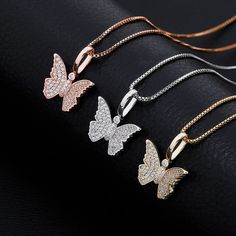 Butterflies are not only beautiful, but also have mystery, symbolism and meaning and are a metaphor representing spiritual rebirth, transformation, change, hope and life. This pendant is created in real .925 Sterling Silver with white prong-set crystals and plated in 3 metal finishes .925 Sterling Silver, gold (vermeil), rose gold (vermeil) Strung on an 16" or 18" Venetian box chain Charm measures 22mm inclusive of bail Spring clasp closure Prong-set stones Clear zircon diamonds Butterfly Shaped Jewelry With Diamond Accents For Gifts, Crystal Butterfly Charm Jewelry, Silver Cubic Zirconia Butterfly Necklace, Crystal Jewelry With Butterfly Charm, White Sterling Silver Butterfly Necklace With Clavicle Chain, Silver Cubic Zirconia Butterfly Pendant Necklace, Silver Butterfly Pendant Necklace With Cubic Zirconia, Butterfly Shaped Diamond White Jewelry Gift, Silver Butterfly Pendant Necklace In Cubic Zirconia