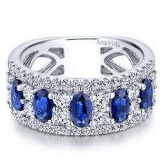 a blue sapphire and diamond band ring