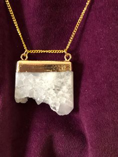 Raw Quartz Crystal Slab Necklace. The cracks and creases show on this beautifully polished piece of stone necklace. This piece of rock is highly valued for its energy capabilities and it can be yours to wear for your special occasions or just when you need a lift. The gold oversized clasp makes it very easy to open and close. This stone is just what you need for that spiritual outing. This crystal stone carries the power of energy to you and helps connect a physical dimension with the mind. For the person who owns this quartz necklace, it can bring energy and smooth the discord and it helps promotes one's inner calm. It allows the energy and vibration of one's natural wisdom to emerge and this helps move toward an emotional balance. We all need this. You need this! This beautiful slab come Quartz Raw Stone Pendant Necklace, Quartz Pendant Necklaces With Raw Stone, Quartz Pendant Necklace With Raw Stone, Agate Necklace With Raw Stone For Gift, Pendant Necklace With Large Mineral Crystal Stone, Raw Quartz Crystal, Raw Quartz, Emotional Balance, Crystal Stone