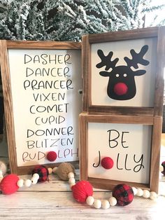 two wooden frames with christmas decorations on them