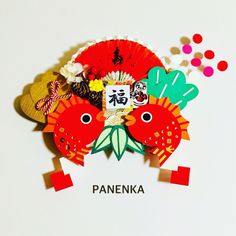 an image of a paper fan with flowers and birds on it's head that says panenka