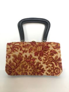 "GORGEOUS carpet bag from Meyer's dating back to the 1960's.  This handbag is in absolute perfect condition.  It looks as though it was never used  There is a beautiful motif on the front and back of the bag made from cut velvet  The coloration is so vivid and bold.  It is an accordian bag, meaning the sides expand giving you more space for objects you need to carry along with you.  Below are the measurments of the bag. handles height- 5\" width- 6\" bag length- 7\" width-12\" depth- 2\"-6\" Mad Vintage Box Bag With Removable Pouch For Shopping, Vintage Satchel With Detachable Strap For Shopping, Vintage Rectangular Box Bag For Shopping, Vintage Rectangular Evening Bag For Shopping, Vintage Bags With Detachable Strap For Shopping, Vintage Tapestry Bag For Evening, Vintage Evening Bag In Tapestry Material, Vintage Box Bag With Removable Pouch, Red Vintage Square Bag