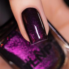 Bewitched unveils a blackened eggplant base, glimmering with pink shimmers that blend into a profound purple when coated within the dark base. Cast your nails into a realm of darkness and magic and watch in awe as each movement radiates a spectral glow as the shimmers interact with light.

Bewitched is part of the Coven Collection, 6 eerie shades crafted for those who find beauty in the shadows. Each color whispers secrets of midnight rituals and moonlit nights, shimmering and shifting like the Dark Purple Nail Polish, Ilnp Nail Polish, Dark Purple Nails, Color Whisper, Shimmer Nail Polish, Purple Nail Polish, Nail Shimmer, In The Shadows, Find Beauty