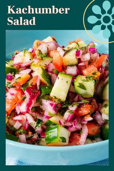 a blue bowl filled with chopped vegetables on top of a table