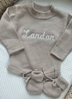 ✿ Welcome to our shop ✿ Our goal is to bring you the cutest and trendiest designs on the highest quality sweatshirts and shirts. All of our products are designed, embroidered, and shipped from our NJ studio. KNIT SWEATER BUBBLE ROMPER DETAILS: 100% Cotton Snap buttons for easy dressing & diaper changes True-to-size, with extra room in the length to grow with baby Name is embroidered onto romper Includes: 1 Knit Sweater Bubble Romper in the color fawn (Accessories sold separately) Care Instructio Embroidered Newborn Outfit, Newborn Hospital Outfits, Embroidered Apparel, Studio Knit, Neutral Baby Clothes, Hospital Outfit, Going Home Outfit, Newborn Outfit, Easy Dressing