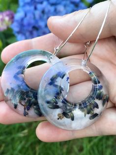 "Handmade Resin Earrings with Real Lavender Flowers.  Choose your shape and hoop size.  More styles coming up Shape Sizes: Small Diamond - 35mm x 25mm (1.4\" x 1\") Large Square - 40mm x 40mm (1.6\" x 1.6\") Circle Diameter - 40mm (1.6\") Hoop Sizes: Small - 15mm (0.6\") Medium - 25mm (1\") Large - 35mm (1.4\")" Handmade Clear Round Hoop Earrings, Handmade Clear Hoop Earrings, Handmade Small Hoop Earrings Nature-inspired, Handmade Small Hoop Nature-inspired Earrings, Handmade Small Hoop Earrings, Nature-inspired, Handmade Small Nature-inspired Hoop Earrings, Handmade Clear Hoop Earrings As Gift, Handmade Clear Hoop Earrings For Gift, Handmade Nature-inspired Hoop Earrings