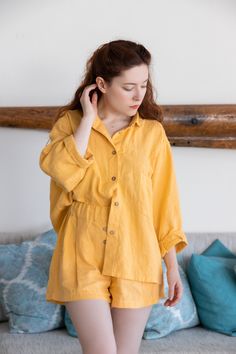 "Welcome to Pavietra! This set of linen pajamas made up of an oversized shirt with pocket detail, which is decorated with handmade stitches, and loose-fitting shorts with an elastic waist and coconut button detail. It can be worn at home and out. PAJAMAS DETAILS ⚬ Oversized fit ⚬ Made of washed organic Oeko-Tex certified linen grown in Belarus. ⚬ Side pockets. ⚬ Linen is NOT see-through. ⚬ Your choice of 20 colors. ⚬ Sizes XXS to 3XL (please see detailed size chart in photos). ⚬ If you would lik Summer Loungewear Sets, Summer Loungewear Sets In Short Length, Summer Loungewear Sets Short Length, Summer Sets With Relaxed Fit And Short Length, Spring Loungewear Short Set, Relaxed Fit Summer Short Set For Beach, Summer Long Sleeve Sets For Day Out, Relaxed Fit Short Set For Spring And Summer, Summer Sets With Relaxed Fit And Shorts