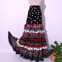 "Gorgeous flamenco dance skirt made of knitted fabric, adjustable to the waist and hip. Ideal for rehearsal and shows. Please bear in mind that the items are handmade-to-order and by assignment following the customer's instructions. If you need help taking your measurements, please have a look at this video: https://www.youtube.com/watch?v=jvGEVbgIXPU ------------------------------------------ Exchange and Return Policy At Morena Luna, we take pride in providing our customers with made-to-measure products that are tailored specifically to your preferences and requirements. Each product is meticulously crafted to meet your unique specifications, ensuring the highest level of quality and satisfaction. As a result of this personalised approach, we regret to inform you that we are unable to ac Red Ruffled Skirt For Dance, Fitted Multicolor Skirt With Attached Cancan, Red Bohemian Skirt For Dance, Fitted Polka Dot Long Skirt, Fitted Long Skirt In Polka Dot, Fitted Belly Dance Skirt With Ruffles, Flamenco Dress Pattern, Flamenco Dress, Flamenco Dancing