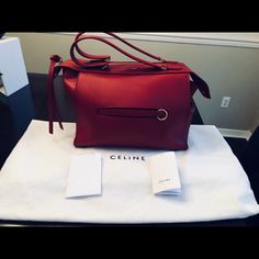 Gorgeous 100% Authentic Celine Ring Bag. Original Price $2550 Asking $2000. Purchased At Neiman Marcus. Please Do Not Ask To Swap Or Reduce Price. Only Serious Buyers Please. Thank You Designer Shoulder Bag With Handle Drop As Gift, High-end Red Office Bag, Luxury Red Office Bags, High-end Red Shoulder Bag For Office, Designer Red Office Bag, High-end Red Shoulder Bag For Formal Occasions, High-end Red Shoulder Bag For Gift, Designer Red Bags For Formal Occasions, Designer Red Shoulder Bag For Formal Occasions