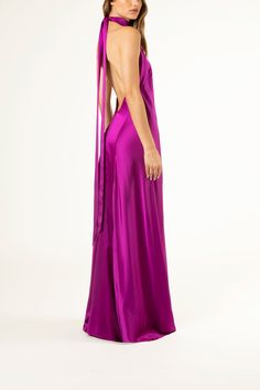 Pure silk charmeuse backless halter gown cut on the bias. Featuring a low open back and long ties at neck that can be double knotted or tied in a bow. Fully lined in silk. Made in USA.   Composition: 100% silk Dark Purple Dresses, Silk Prom Dress, Backless Gown, Halter Gown, Guest Attire, Prom Dress Inspiration, Wedding Attire Guest, Darling Dress, Silk Charmeuse