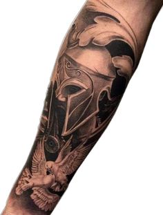 a man's arm with a helmet and eagle on it