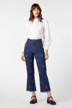 Embrace the flair of florals with the Tulip Embroidered Jean, where every day is a garden party for your legs. With sweet all-over tulip embroidery, these jeans are a love letter to the bold and the beautiful. The high-waisted silhouette cinches at just the right spot before blossoming into a fitted hip and flick-style flare that’ll make you want to strut and twirl. But wait, there’s practicality amidst this prettiness - a back yoke to enhance your curves, front and back pockets for stashing your secrets, and convenient belt loops for when you want to cinch or sass it up. Crafted from 100% cotton, they promise breathability alongside their undeniable charm. In these jeans, you’re not just walking; you’re blooming with every step. Ready to plant some smiles as you go about your day?100% COT Tulip Embroidery, The Bold And The Beautiful, Princess Highway, Picnic Dress, A Love Letter, High Waist Fashion, Blouse Pants, Bold And The Beautiful, Outerwear Vest