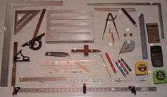 various tools are laid out on a white surface, including scissors, tape and other items