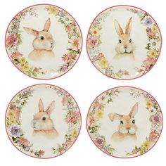 four plates with rabbits and flowers on them