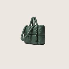 Anomaly Finds Puffer Tote | Green Green Travel Bags For Winter, Green Winter Bags, Green Everyday Bag For Winter, Green Rectangular Shoulder Bag For Winter, Green Winter Shopping Bags, Functional Winter Bags For Daily Use, Versatile Green Bag For Fall, Versatile Green Bags For Fall, Modern Green Bag For Fall