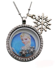 "This Frozen inspired necklace is sure to be a hit with your princess. A perfect addition to any photo session, playing dress-up, or just every day fun. The greatest thing about these beautiful necklaces, is that you can switch the frozen items in and out. You can turn this into a regular floating locket necklace as you please just by adding your own charms. These have been a huge hit and will be talked about every time you wear it. These make wonderful gifts for your biggest Frozen [princess] f Disney Style Silver Jewelry With Charms, Silver Disney Charms Jewelry, Disney Silver Jewelry With Charms, Disney Silver Jewelry For Birthday, Disney Silver Charms Jewelry, Personalized Princess Style Jewelry For Gifts, Personalized Princess Style Jewelry Gift, Personalized Disney Silver Jewelry, Themed Round Pendant Jewelry For Gifts