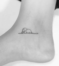 an elephant tattoo on the ankle is shown in black and white, as well as a line drawing